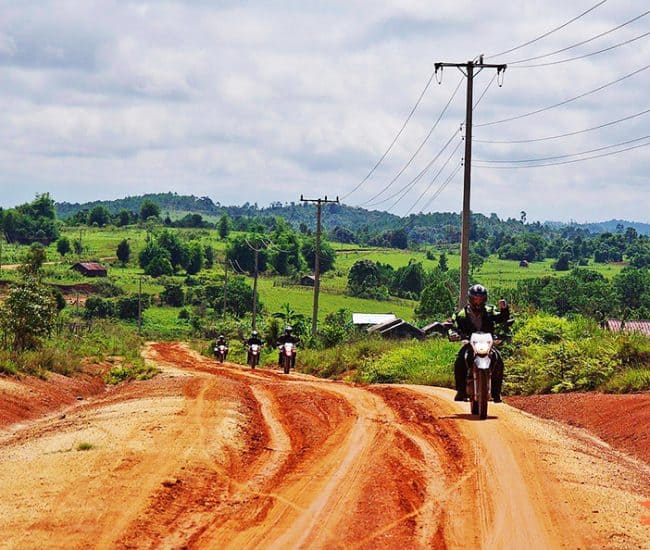 Vietnam Destinations vang vieng by motorbike 5 650x550 1