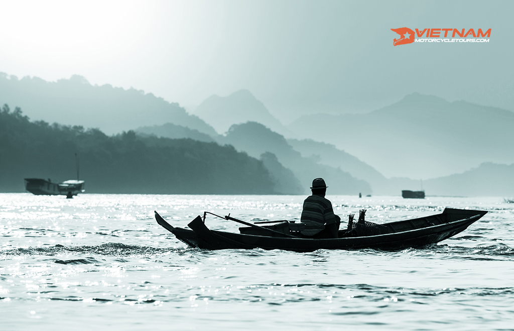 Experience With Motorcycle Tours Vietnam Laos 6 boat in laos